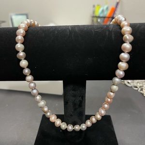 Pinkish, grayish freshwater pearl necklaces. 16”.